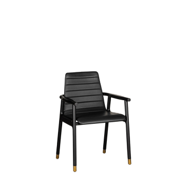 Joyce è una poltroncina in legno di frassino tornito dal design unico e iconico. La seduta applicata alla struttura in legno massello si presenta completamente rivestita in pelle, con una particolare lavorazione ottenuta grazie alle cuciture artigianali.